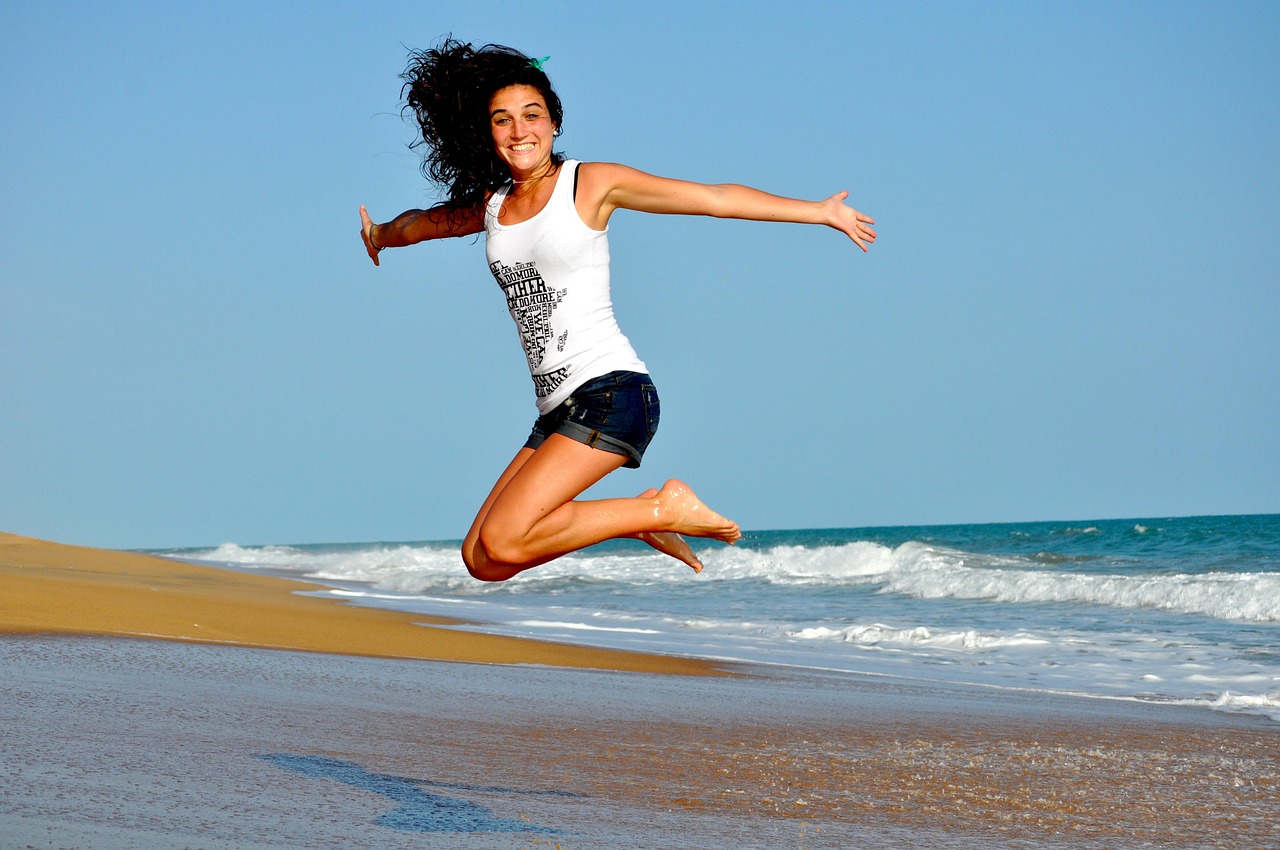 woman, beach, nature, jump, happy woman, female, happy, smiling, smile, waves, sand, sea, ocean, ocean waves, brunette, brunette woman, jumping girl, shore, seashore