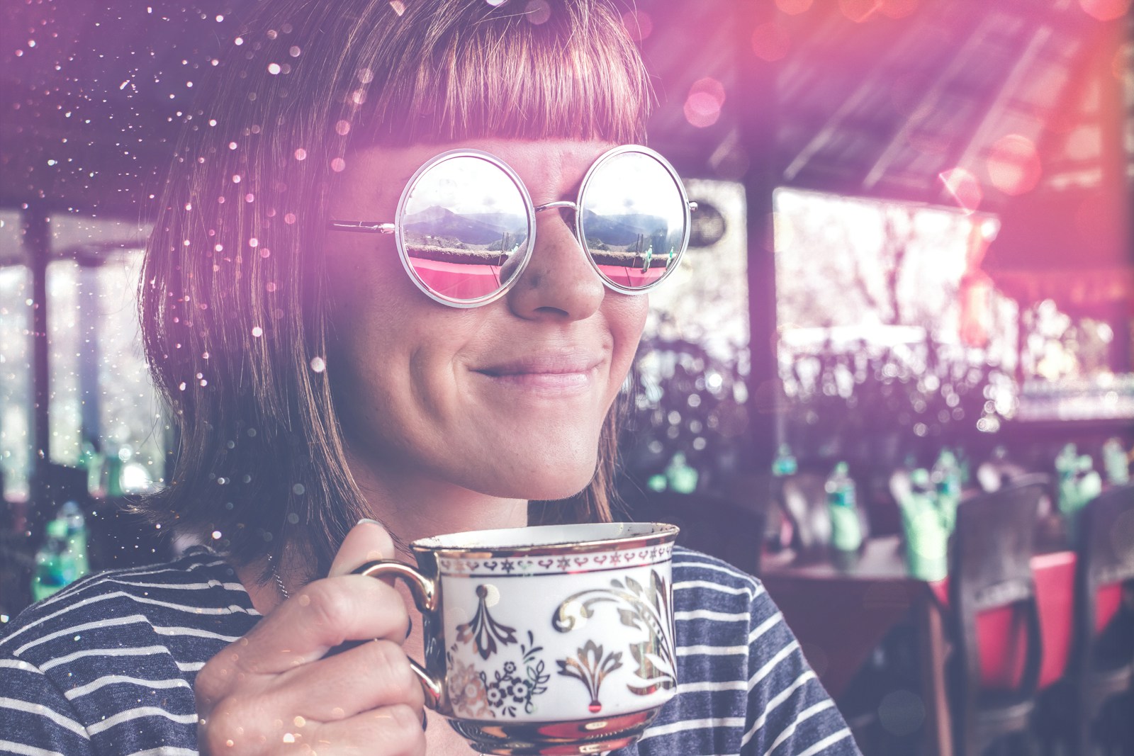 woman holding teacup