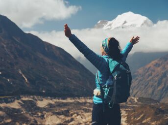 woman, backpack, raised, arms