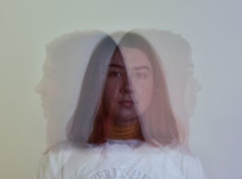 woman in white crew neck shirt