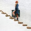 woman climbing on brown concrete stairs