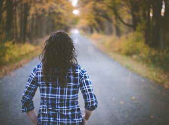 woman walking on street