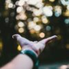 left human hand in selective-focus photography